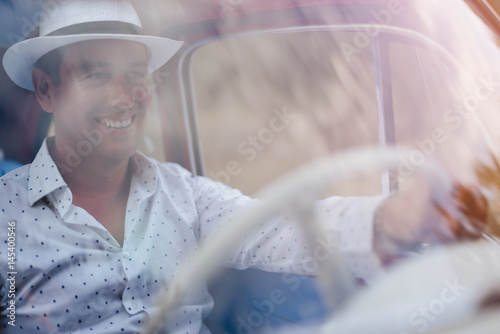 Handsome man in his car