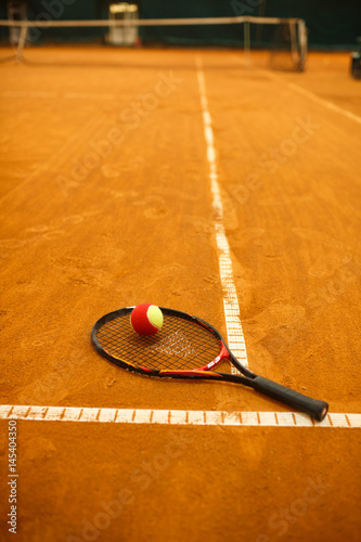 tennis racket and the ball © Elizaveta