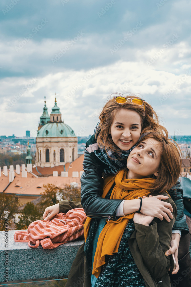 Naklejka premium Two girls in Prague, Czech Republic