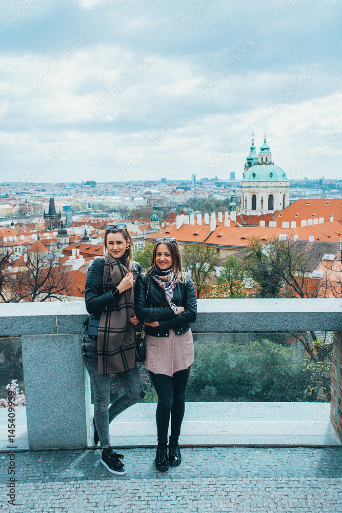 Naklejka premium Two girls in Prague, Czech Republic
