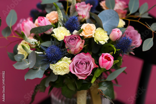 Beautiful bouquet on color background  closeup