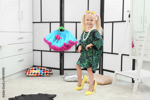 Cute small girl posing in f...