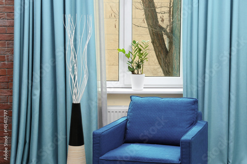 Beautiful home plant on win...