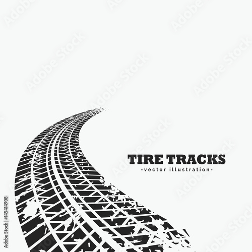 dirty tire tracks fading into the horizon photo