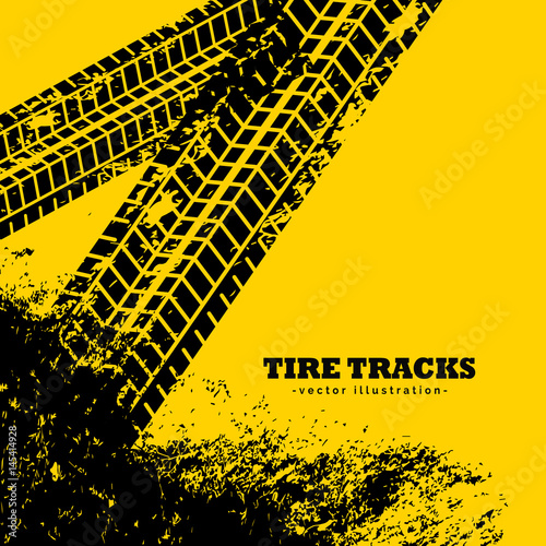 tire tracks marks on grunge yellow background