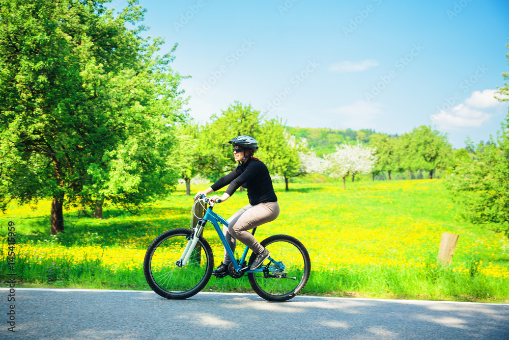 Young Woman Riding Her Mountain Bike