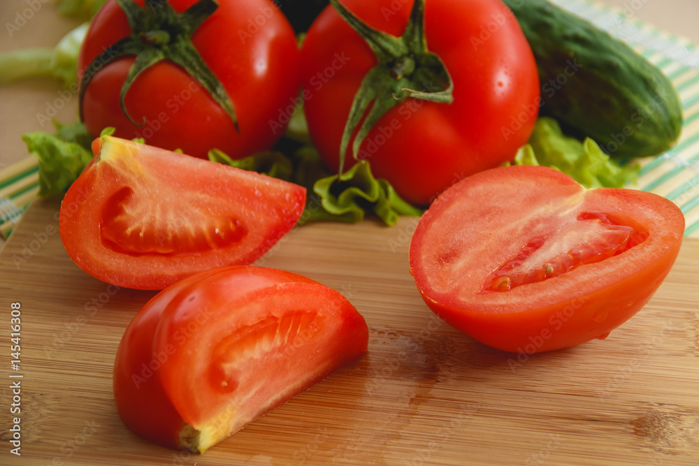 cutted tomato, cucumber vegetable and salad. Health care food. cutted tomato, cucumber vegetable and salad. Health care food.