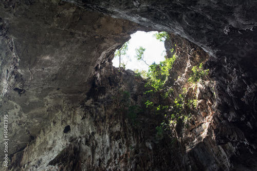 Sunlight shines through the  Than Lot Yai Cave   Chaloem Rattanakosin National Park     Kanchanaburi  Thailand