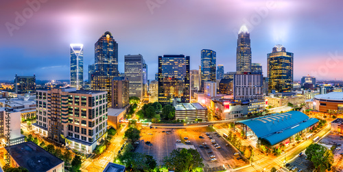 Aerial view of Charlotte, NC skyline on a foggy evening. Charlotte is the largest city in the state of North Carolina and the 17th-largest city in the United States