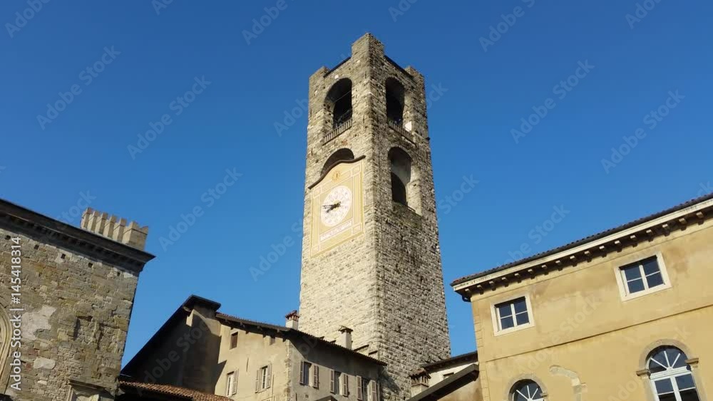 Bergamo - Old city (Città Alta). Landscape on the ancient Administration Headquarter called Palazzo della Ragione and the clock tower called Il Campanone