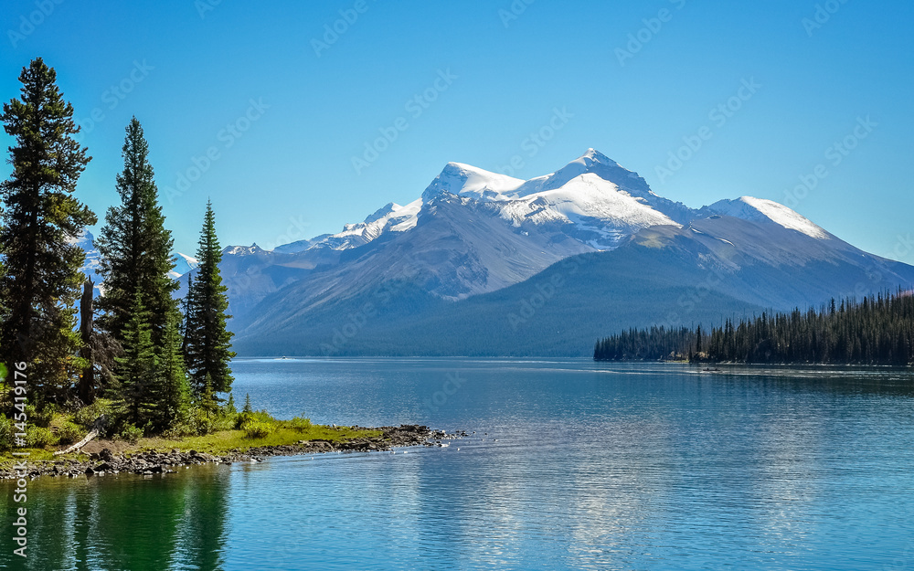Maligne Lake -the largest glacial lake in the Canadian Rockies famous for the beautiful blue color of its water.