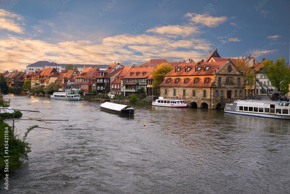 Scenic summer panorama at sunset of the Old Town pier architecture in Bamberg, Bavaria, Germany.
