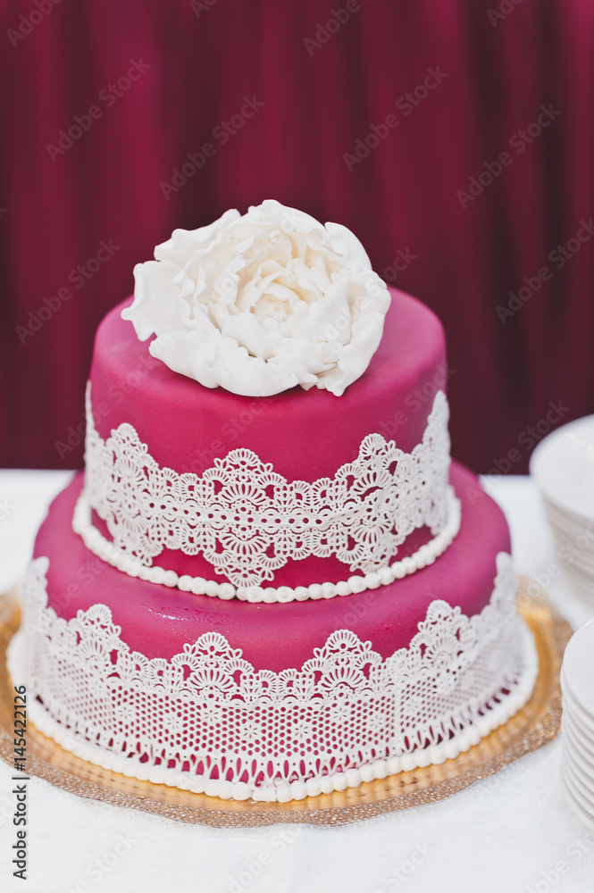 Pink with white decorations cake 7989.