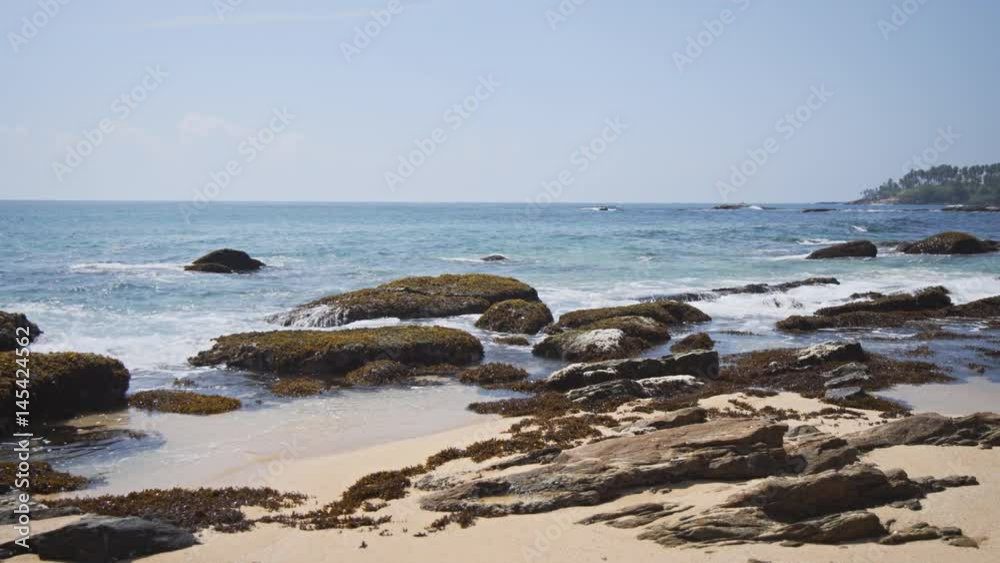 Rocky Tropical Beach in Hikkaduwa, Sri Lanka, with Sound