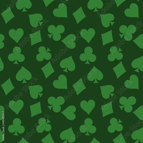 Seamless pattern background of green poker suits - hearts, clubs, spades and diamonds - on green background. Casino gambling theme vector illustration.