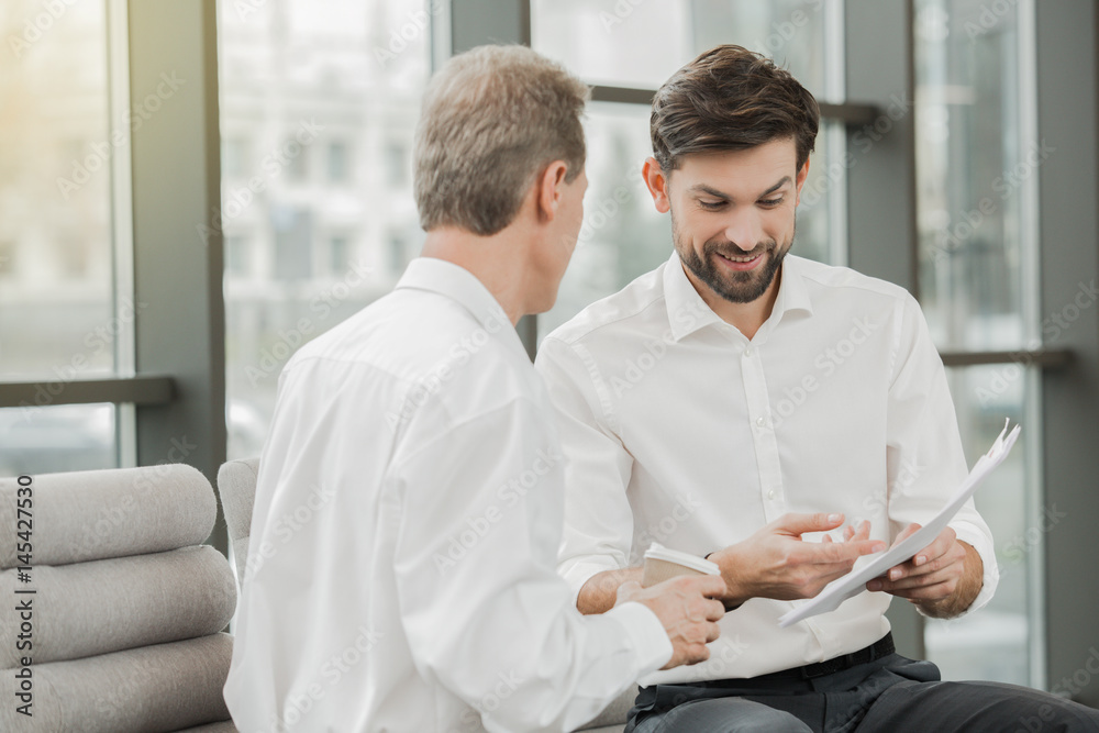 Fototapeta premium Stylish businessmen working in office
