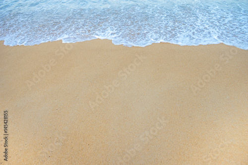 Soft Wave Of Ocean On Sandy Beach. Background. Selective © BUDDEE