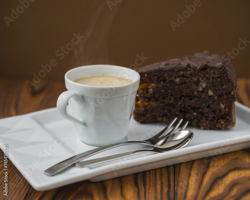 Chocolate cake and cup of coffee