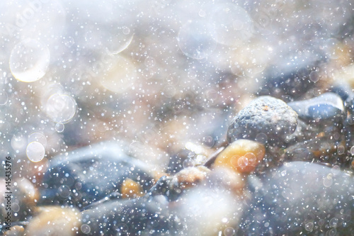 Pebble texture on the river bank © kichigin19