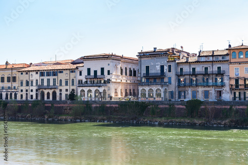 houses on waterfronts in Verona city in spring