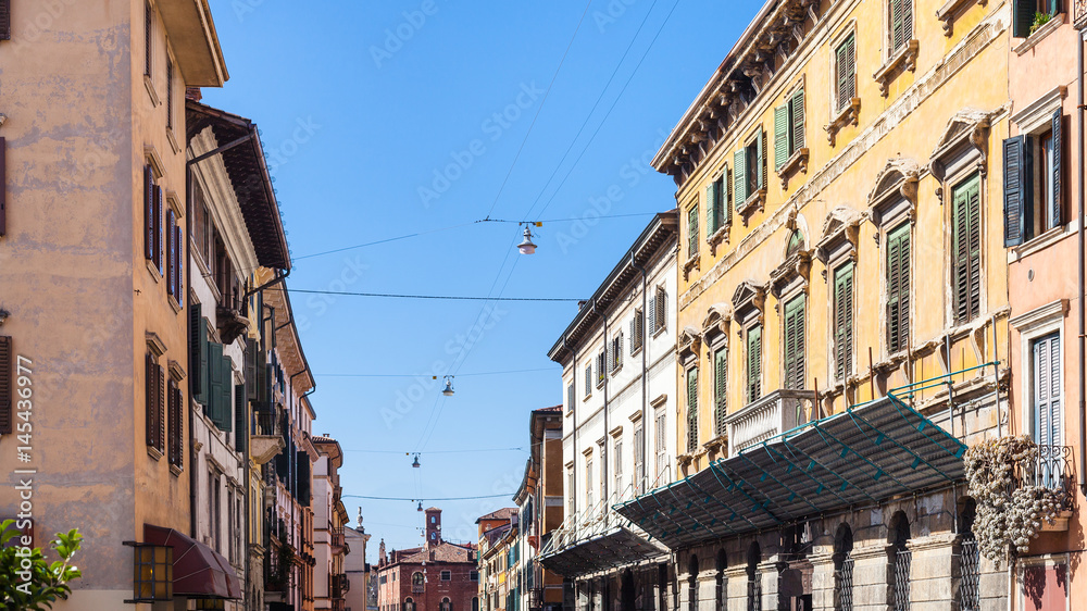 apartment houses on street in Verona city