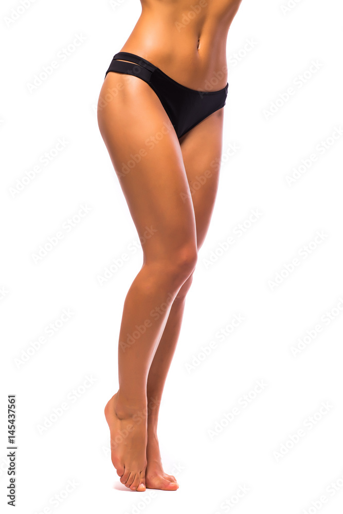 Long pretty woman legs on white background