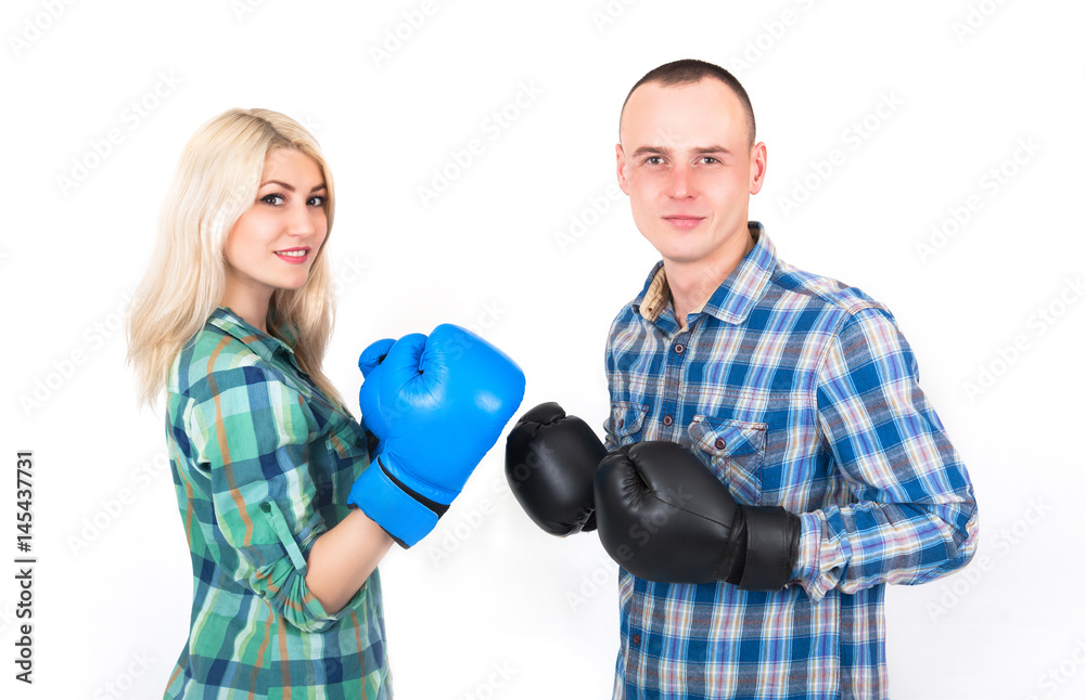 Studio shot of a beautiful funny couple expressive fighting. Studio shot of a beautiful funny couple expressive fighting.