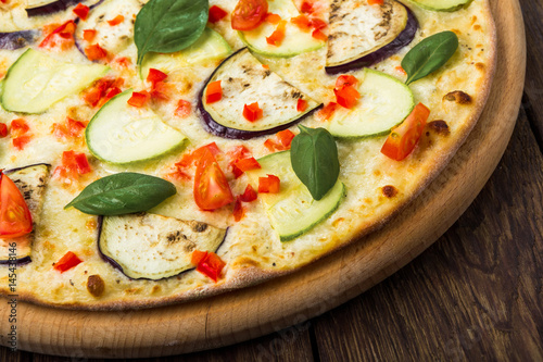 Vegetarian pizza with aubergines and zucchini