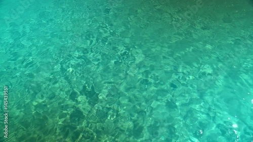 Wallpaper Mural Water in the pool, sunlight is reflected, small waves, 4k video Torontodigital.ca