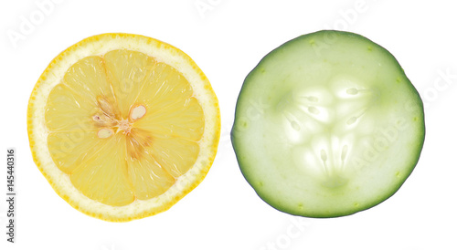 sliced cucumber and lemons isolated on white background.