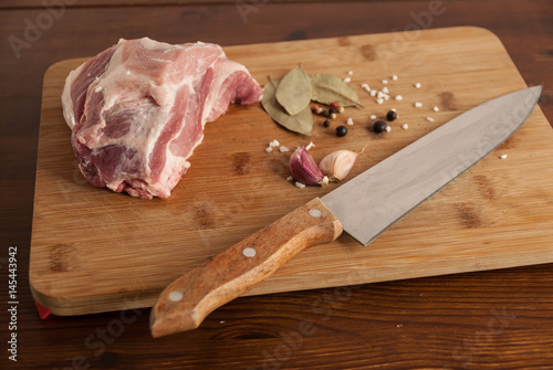 Washed chopped meat with pork shoulder on spice board