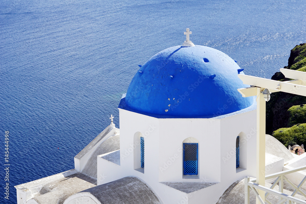 Blue dome Church in Oia, Santorini, Greece