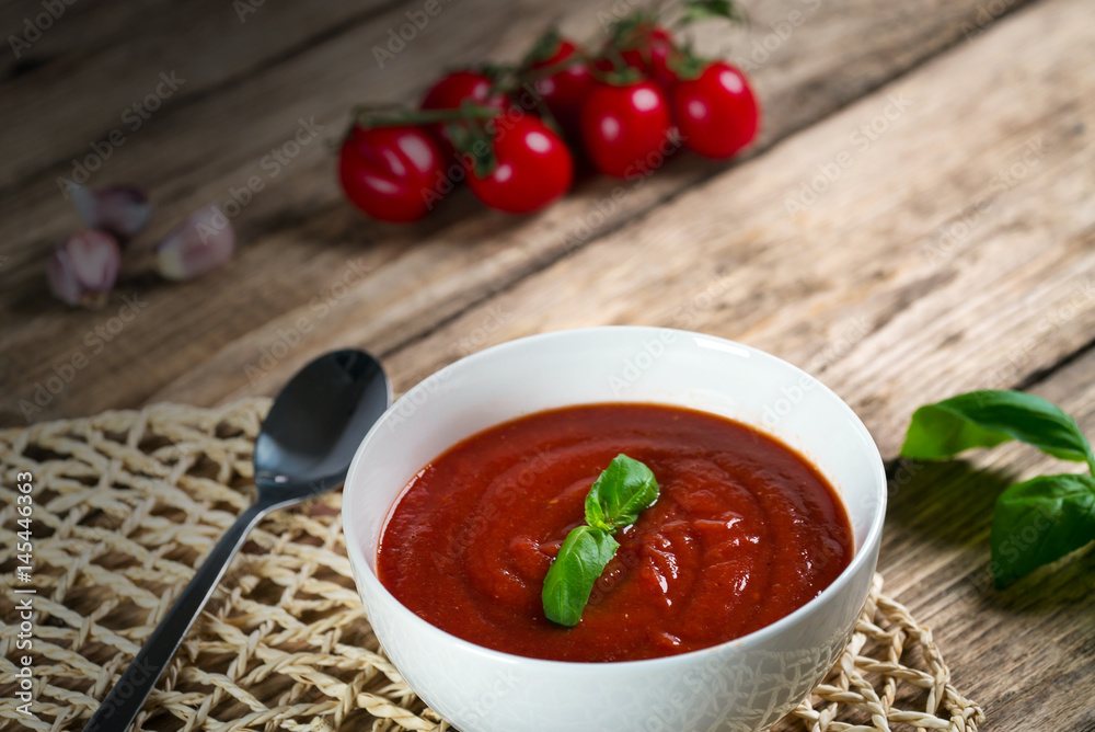 fresh tomato soup in a white bowl fresh tomato soup in a white bowl