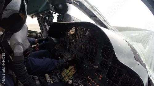 In the cockpit of an airplane taking off