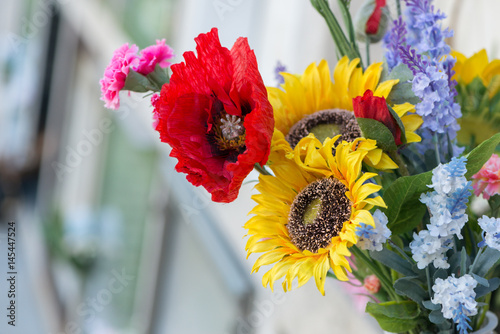 фотографія Flowers in a cemetery