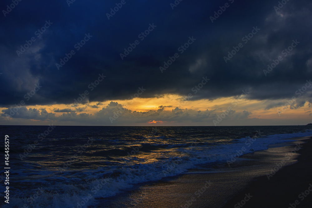 landscape of sea beach and raincloud at dawn ; Songkhla Thailand