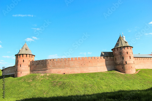 Ancient fortress with towers against the blue sky