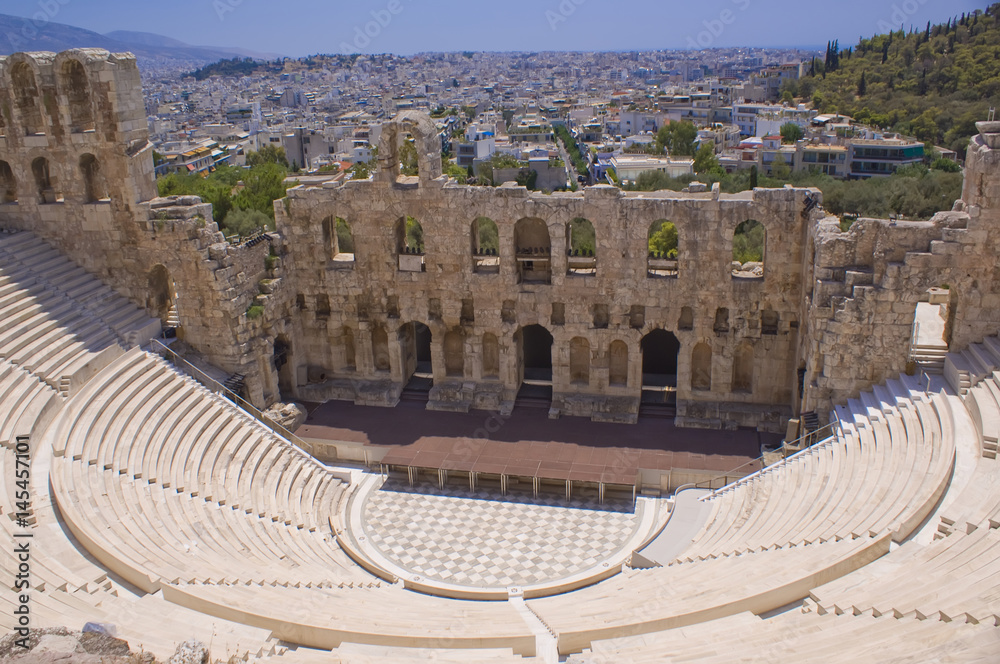 The theatre of Herodes Atticus in Athens. Panorama of the city of Athens in Greece.