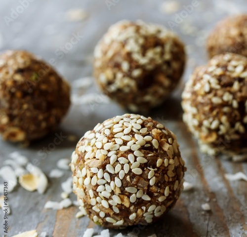 Oats sesame protein balls / Low fat energy bites with oatmeal nuts sesame, selective focus © vm2002