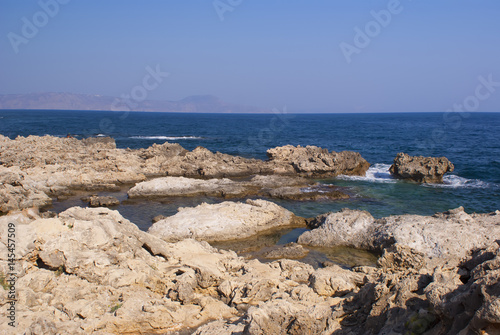 Rocky beach on the Mediterranean sea in Greece
