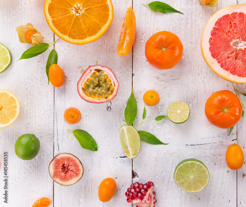 Fototapeta Naklejka Na Ścianę i Meble -  Citrus fruits on white wooden table.