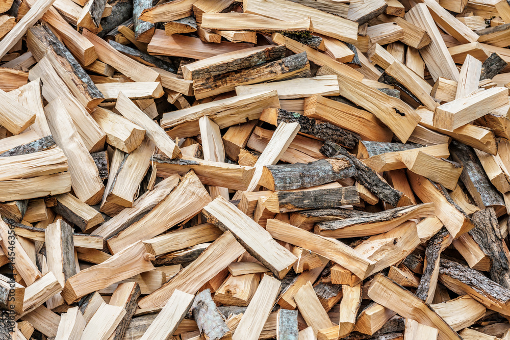 Сhopped firewood background texture Сhopped firewood background texture