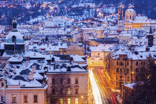Winter in Prague - city panorama with St. Nicholas Church