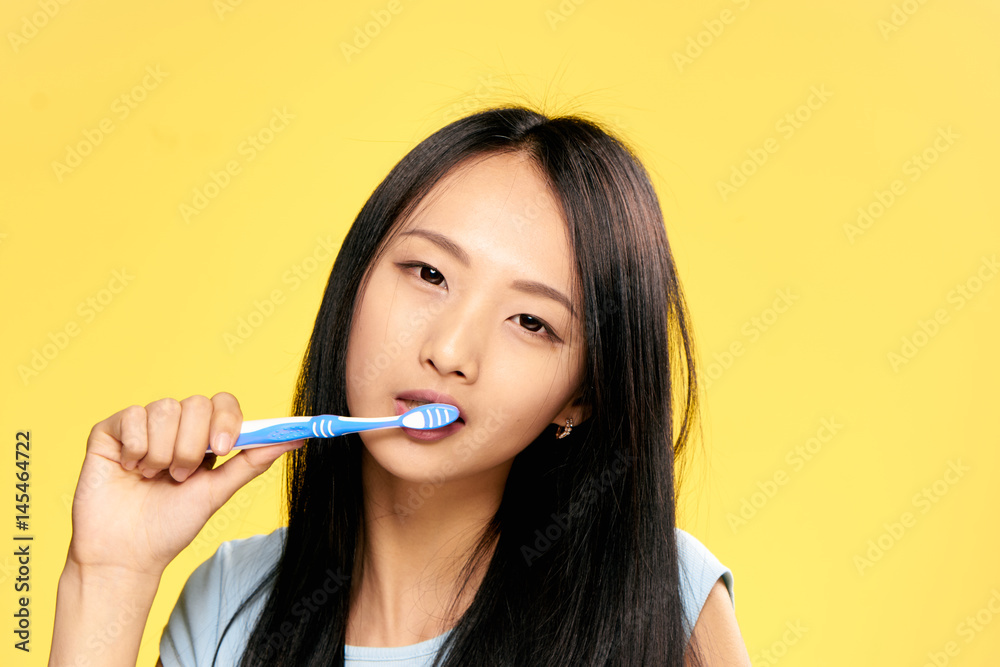 beautiful brunette asian appearance, toothbrush beautiful brunette asian appearance, toothbrush