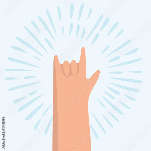 Rock hand gesture on a gray background