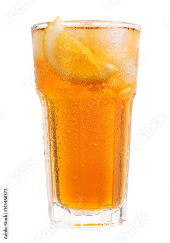 glass of iced tea with lemon on white background