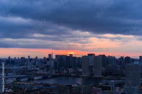 Aerial view of city against in evening