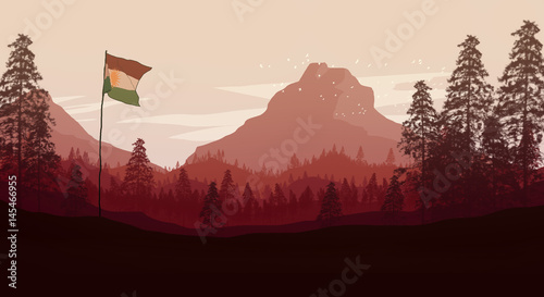 Kurdistan flag with forest and mountains in the background photo