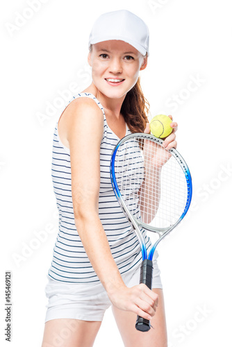 Brown-eyed tennis player posing on white background with props for playing tennis © kosmos111