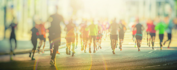 colorful silhouettes of people running in the city 